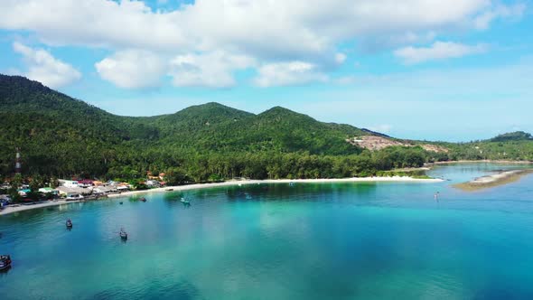 Aerial view seascape of luxury lagoon beach vacation by aqua blue lagoon with white sand background 