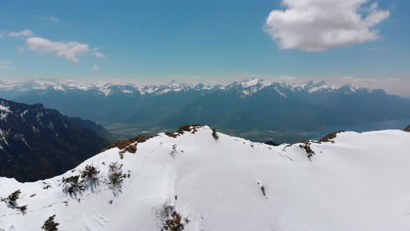 Aerial Drone View on Snowy Peaks of Swiss Alps. Switzerland. Rochers-de-Naye Mountain Peak
