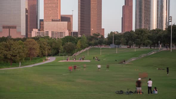 Time lapse of people at park across from downtown Houston. This video was filmed in 4k for best imag
