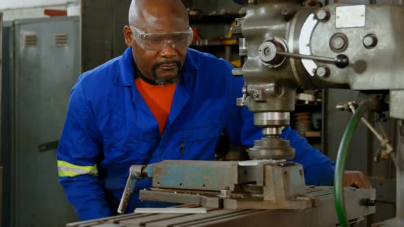 Metalsmith working in workshop 4k