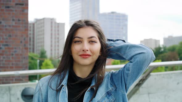 Portrait of beautiful woman in the city. Shot with RED helium camera in 8K