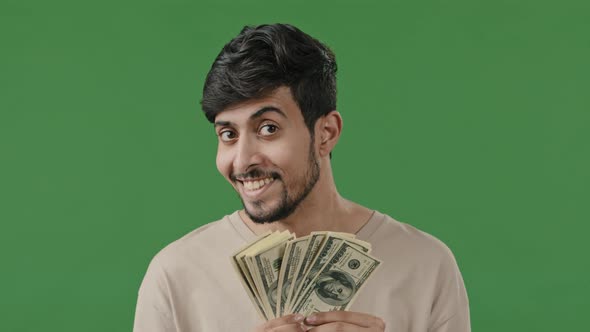 Happy Arabian Man Successful Smiling Hispanic Indian Businessman Isolated in Green Studio Looking at