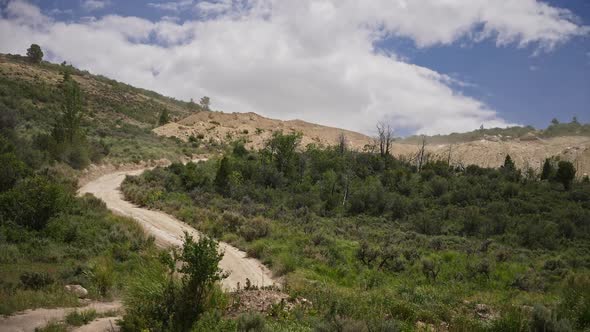 Panning view of fossil quarry on hillside in Wyoming