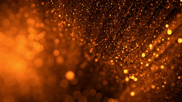 Super Slow Motion Shot of Golden Glittering Particles Isolated on Black Background at 1000 Fps