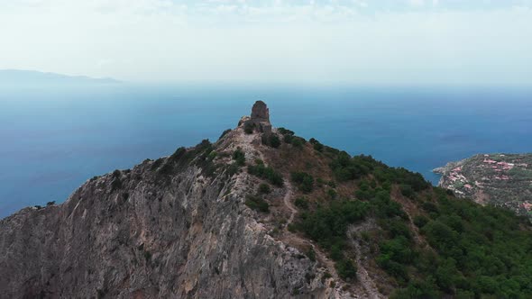 Aerial View of Ancient and Medieval Building on the Top of Mountainrocky Coastline with Green