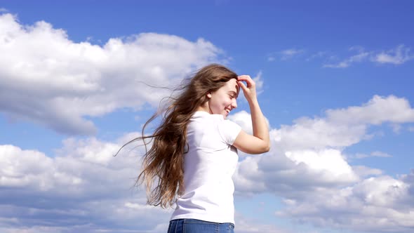 Happy Child Has Long Beautiful Hair Enjoy the Sun on Sky Background Childhood