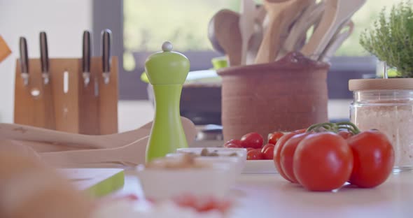 Detail of Kitchen Table with Tomatoes and Tools