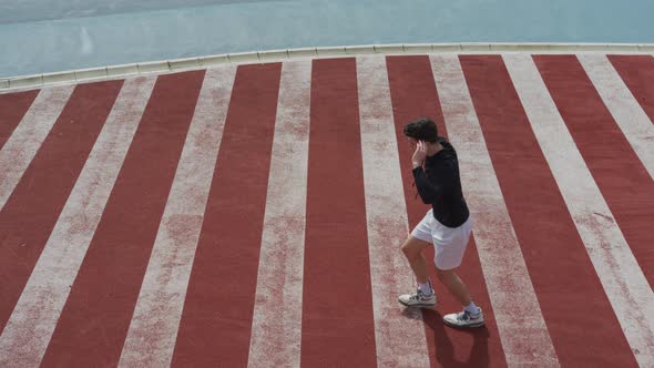 Young man doing lunges