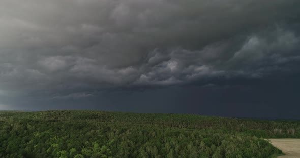 Aerial Dark Ominous Grey Storm Clouds. Dramatic Sky. Lighting In Dark Stormy Clouds alt