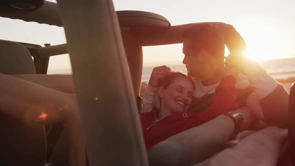 Couple in love enjoying free time on road trip together