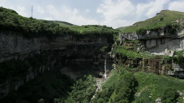 Summer huge rock formations and a waterfall