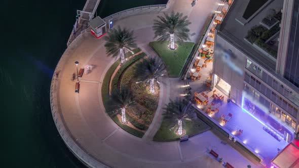 Waterfront Promenade in Dubai Marina Aerial Night Timelapse