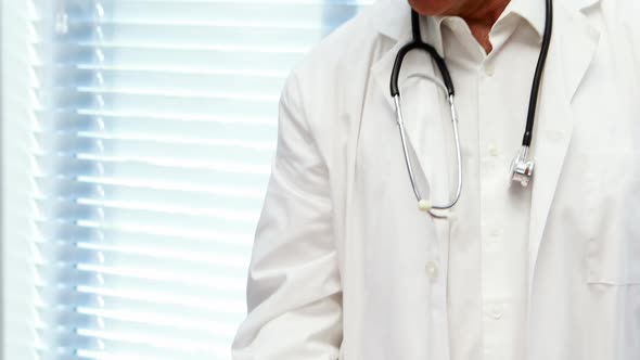 Male doctor examining a patient