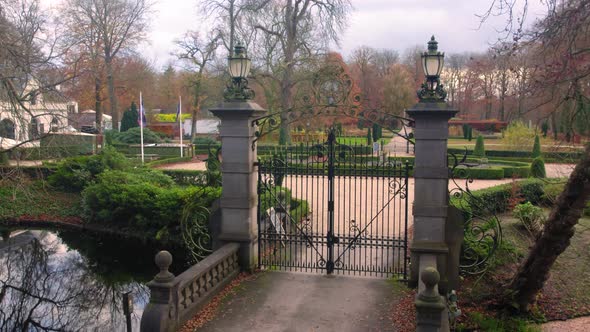 veluwe, staverden castle, groevenbeek castle entrance gate, drone reveal park and path inside the re