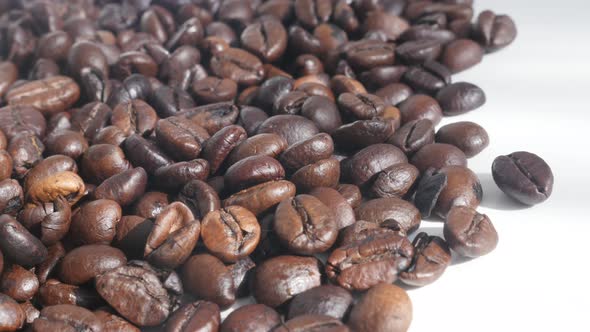 Slow pan over roasted  coffee beans  4K video