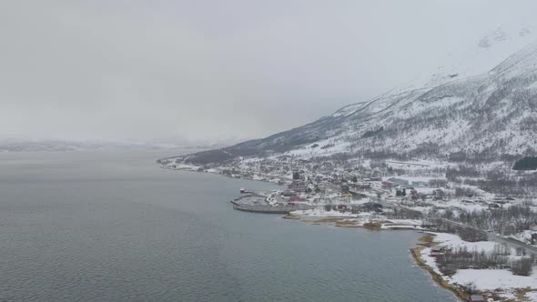 View of Olderdalen town covered in snow from over Kaafiord; aerial