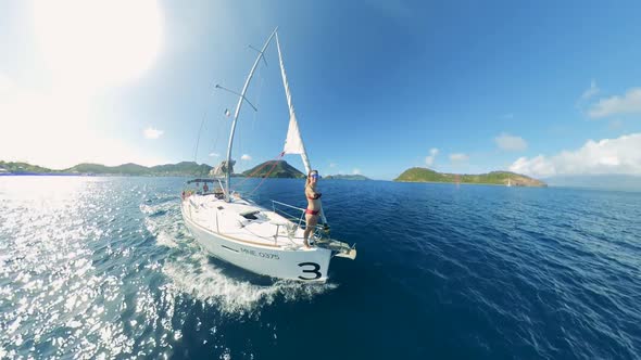 A Lady Is Filming Herself Onboard of a Sailing Boat