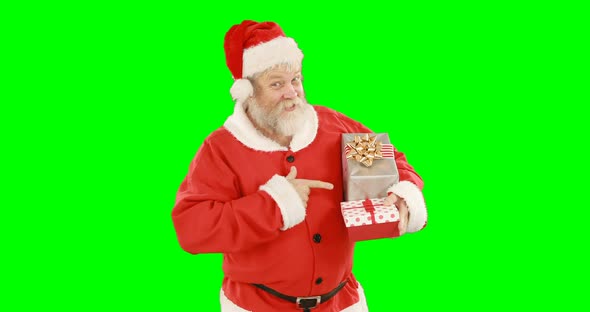 Santa claus holding a gift box