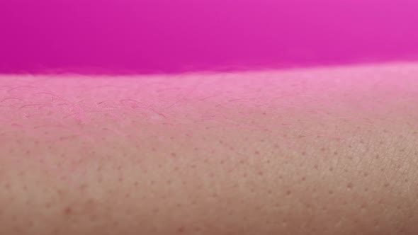 Hand Skin in Pink Neon Light Human Body Part and Ultraviolet Arm Surface Macro Shooting