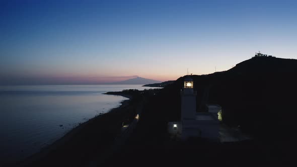 Lighthouse By Night