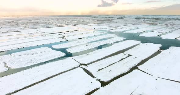 Aerial view of marshland covered with snow in The Netherlands.