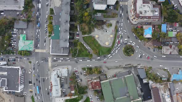 Aerial View Vertically Down of Traffic at an Intersection with Traffic Lights
