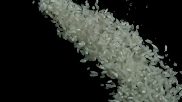 Rice is Poured Into Water