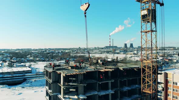 Block of Flats Is Getting Built By the Workers in the City alt