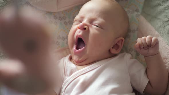  - A Slow Motion of a Yawning Baby Girl