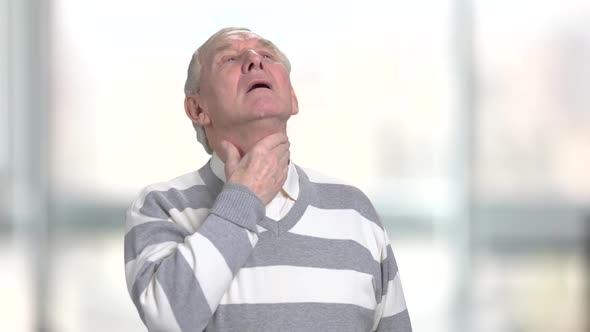 Mature Man with Sore Throat