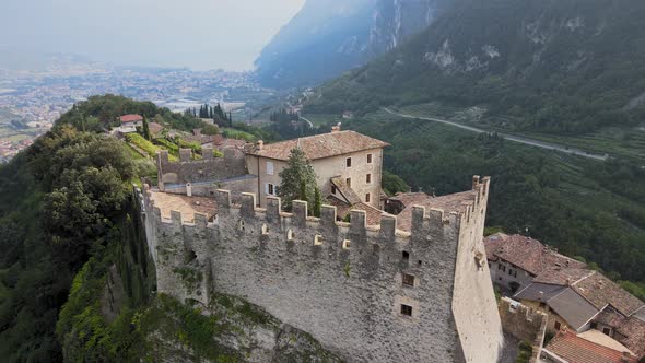 Old Medieval Castle on Hilltop Above Riva Del Garda City, Italy, Trento Province Aerial View of Cast