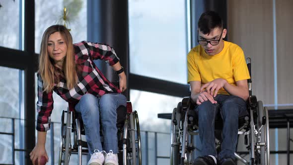 Excited Bocce Players in Wheelchairs During Game