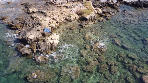 Aerial Video View From Drone on Underwater Reefs and Coastal Rocks in Mediterranean Sea Near Beaches