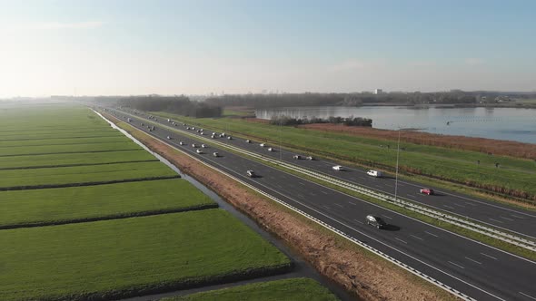 European highway traffic in countryside, inter-city connection, aerial view