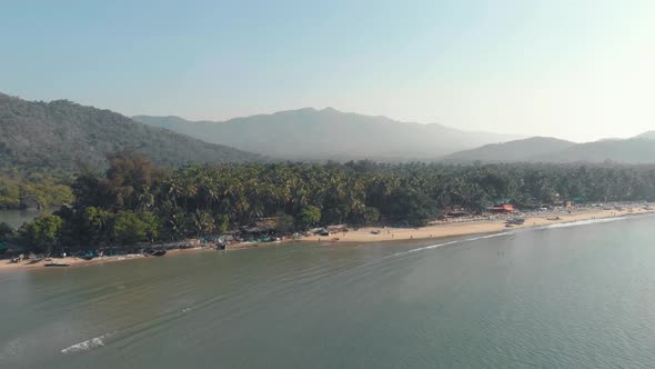 Coastal exotic shoreline and tourist beach resort in Palolem Beach, in Goa, India