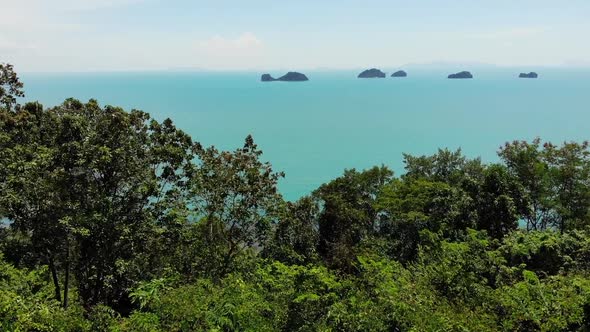 Five Sisters Islands in Serene Water Surface. Enchanting Landscape, Greenery and Deep Calm Water