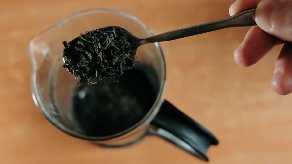 Man Add Matcha Green Tea Powder Into Bowl. Matcha Organic Green Tea. Matcha Tea Ceremony. Close Up