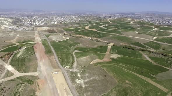 Land Development and Urban City Planning in New Suburban Complex with Developing Infrastructure