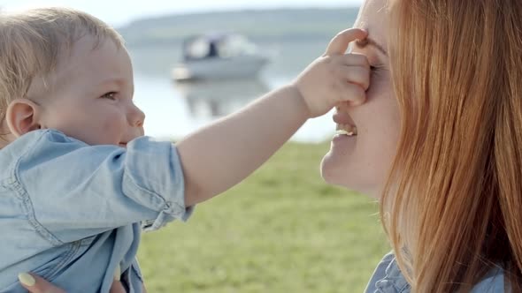 Cute Toddler and Mother Playing alt