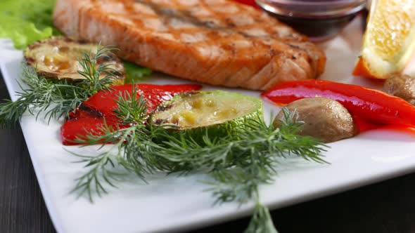 Grilled Salmon Fish Steak Served with Vegetables Seafood Concept