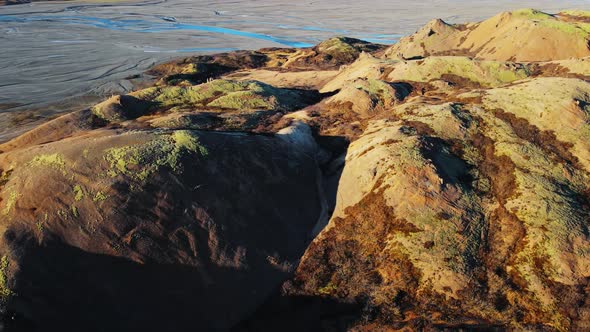 Drone Rising Over Hvannagil Canyon Under Blue Sky