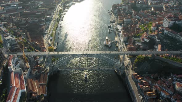 Scenic View of a City on Riverbanks with Medieval Architecture and Docks