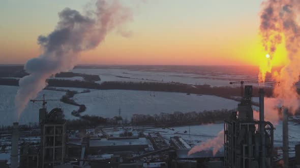 Aerial View of Cement Factory with High Concrete Plant Structure and Tower Crane at Industrial