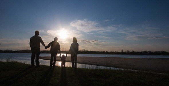 Happy Family Walking on River Bank 4