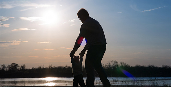 Happy Family Walking on River Bank 9