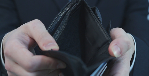 Businessman Showing Empty Wallet