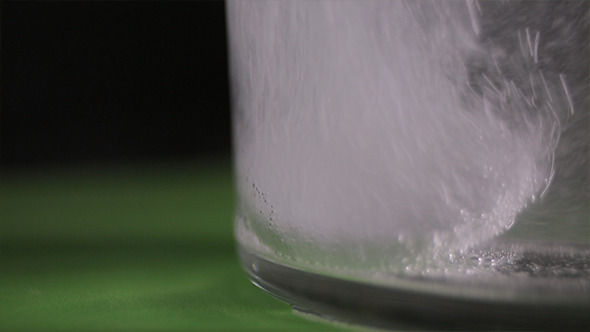  Effervescent Tablet Of Aspirin In A Glass Of Water