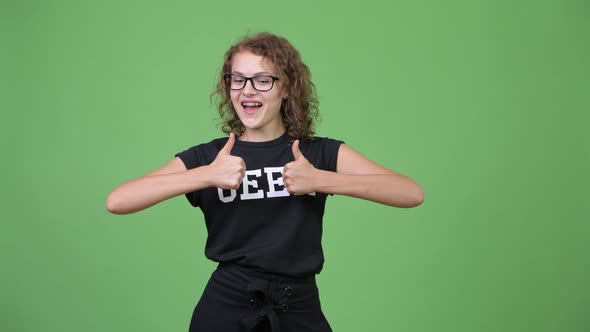 Young Happy Beautiful Nerd Woman Giving Thumbs Up