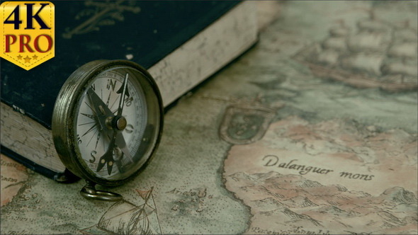 Left Angle View of the Compass and the Book alt