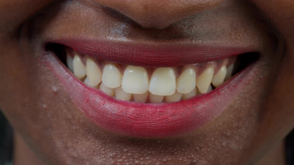 Macro Shot of Female Model Showing Candid Smile on Camera